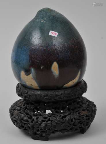 Porcelain peach. China. 19th century. Chien style glaze of blue infused with purple. 5-1/2