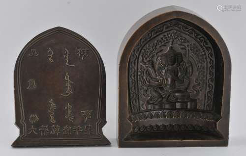 Bronze image mould. Ch'ien Lung mark and period (1735-1796). Image of a Buddha. Inscriptions in Tibetan and Chinese. 4