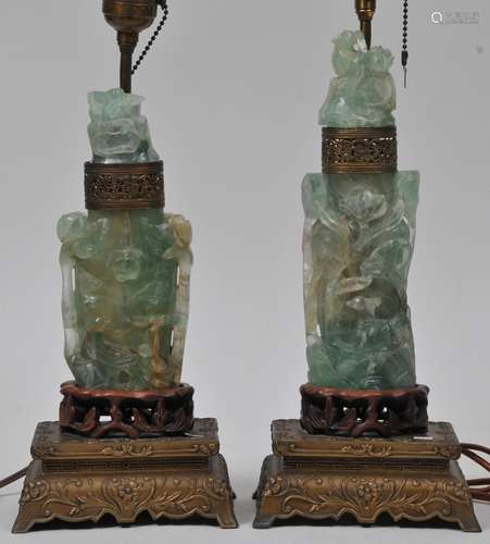 Pair of Flourite vases. China. Late 19th to early 20th century. Surface carved with birds and flowers. Each about 8-1/2