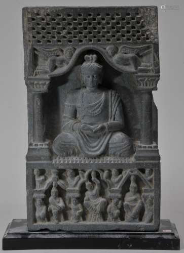 Grey schist carving. Gandharan Kingdom. (3rd c DC-2nd c AD) Seated figure of Amida Buddha. 13-1/2