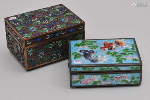 Lot of two enamels boxes. China. Early 20th century. One decorated with goldfish, the other of Cloisonné with stylized lotus scrolling. Largest- 6