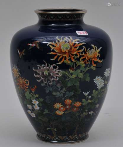Cloisonné vase. Japan. Meiji period. (1868-1912). Birds and chrysanthemums on a midnight blue ground. Attributed to Hayashi Kodenji. 6-1/4