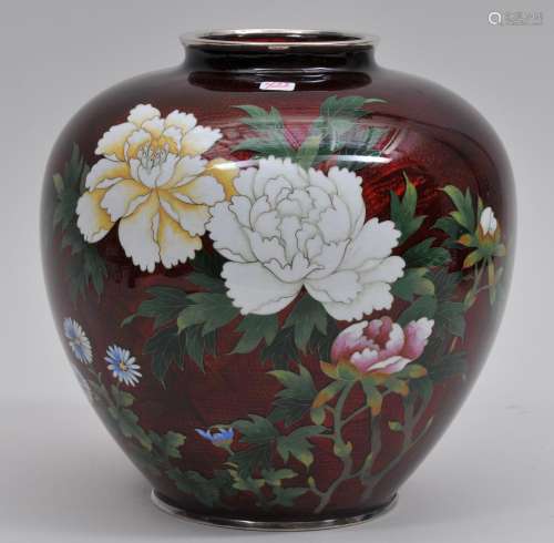 Cloisonné vase. Japan. First half of the 20th century. Pigeons blood bas taille ground with flowers in standard cloisonné. Silver mounts. 8