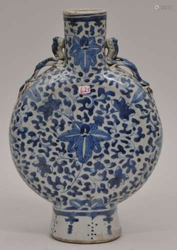 Porcelain moon flask. China. 19th century. Dragons at the shoulders. Underglaze blue lotus scrolling. 10-1/2