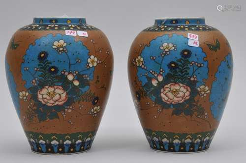 Pair of Cloisonné on porcelain vases. Japan. Meiji period. (1868-1912). Floral decoration. Signed Takcuchi Chubei. 6-3/4