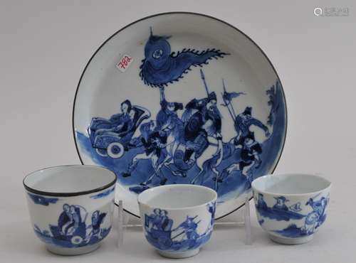 Lot of four porcelains. Chinese Export to South East Asian. Underglaze blue decoration of historical scenes. Saucer and four cups. Two with copper rims. 6-1/8