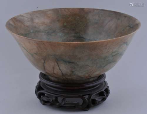 Jade bowl. China. 18th century. Chicken bone colour with veins of bright green and black. 6-1/2