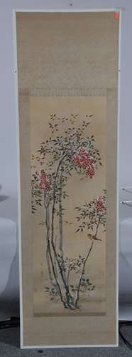 Hanging scroll. Japan. 19th century. Ink and colours on paper. Scene of a sparrow on a snow covered berry bush. 48