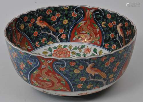 Porcelain bowl. Japan. Meiji period (1868-1912). Foliated edge. Decoration of birds and flowers. 12-1/2