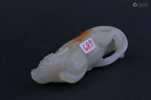 Jade mythical animal China. 19th century. White stone with russet markings. 3-1/4