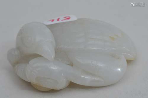 Jade carving. China. 19th century. Highly translucent white stone. Carving of a hawk with a snake. 2