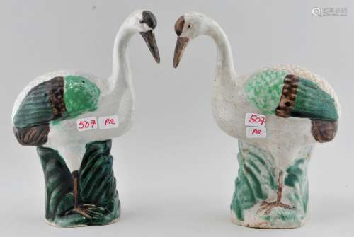 Pair of stoneware cranes. China. 19th century. Glaze of white, green and brown. 5-1/4