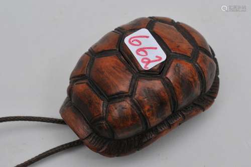 Hardwood Netsuke. Japan. 19th century. Carved as a tortoise shell. 2