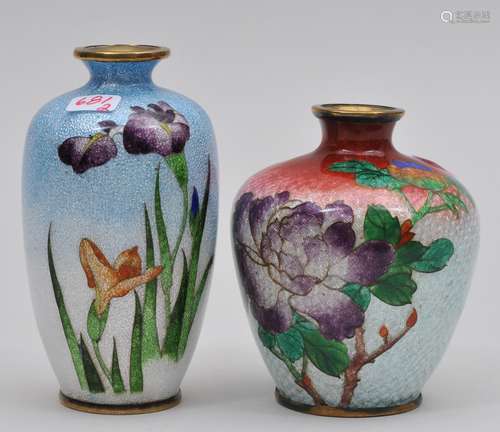 Two Cloisonné vases. Japan. Meiji period. (1868-1912). Decoration of flowers on shaded grounds of red and blue. One signed. 3-3/4