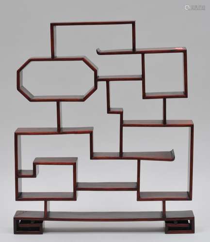 Hardwood tiered display stand. China. 20th century.  17-1/4