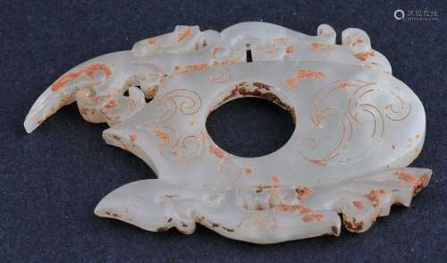 Archaic Ritual Jade. China. Han style. White stone with calcified deposits. Pierced and cut with various projections. 2-1/2