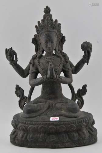 Bronze Buddhist Image. Nepal. 19th  century. Seated figure of Avalokiteshvara. 8-1/2