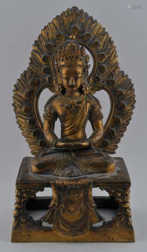 Gilt bronze Buddhist image. China. 18th century. Seated figure of Amitayus with a flame halo at the back. 8