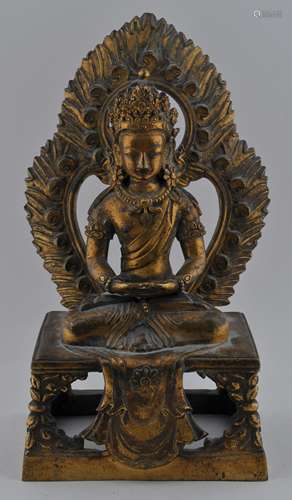 Gilt bronze Buddhist image. China. 18th century. Seated figure of Amitayus with a flame halo at the back. 8