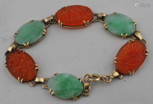 Jade and Carnelian bracelet. Six cabochons: 3 apple green jade and 3 pf carnelian carved with flowers.