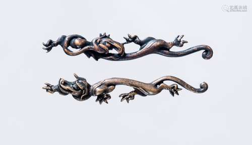 A PAIR OF STYLIZED RAIN DRAGON MENUKI