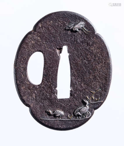 A SMALL IRON TSUBA WITH EGRETS