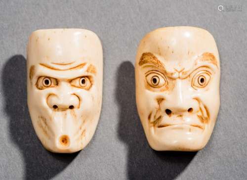 TWO IVORY MASKS OF USOFUKI AND BESHIMI