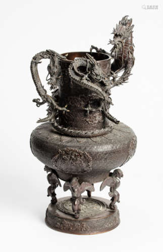 AN ELABORATE BRONZE VASE WITH DRAGONS
