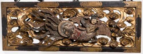 A VERY LARGE AND ELABORATE LACQUERED WOOD PANEL WITH TENNIN (BUDDHIST ANGEL)