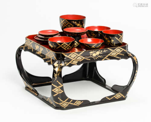 SET OF SIX SMALL LACQUERED BOWLS AND STAND