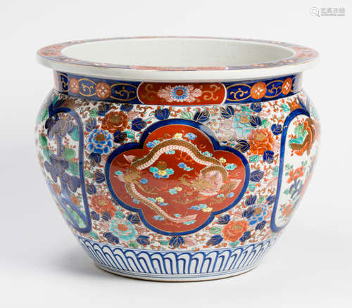 AN ELABORATELY ADORNED IMARI CACHEPOT