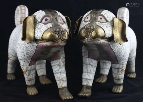 A Pair of Chinese Cloisonne Enamel Figures of Dogs.