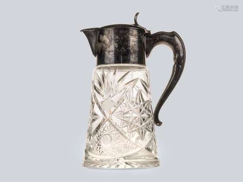 A Silvered and Crystal Decanter.