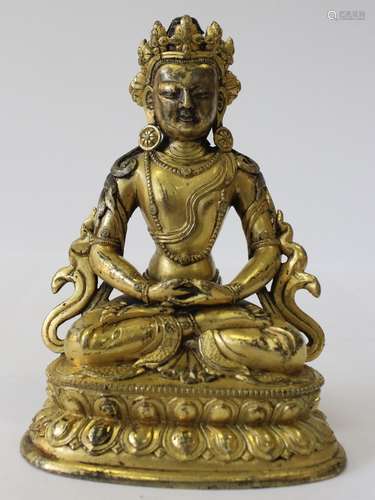 A Gilt Bronze Figure of Amitayus, China, 18th Century.