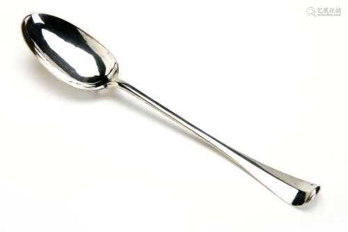 A large Dutch silver serving spoon