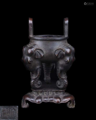 A BRONZE ELEPHANT SHAPED TRIPOD CENSER WITH MARK