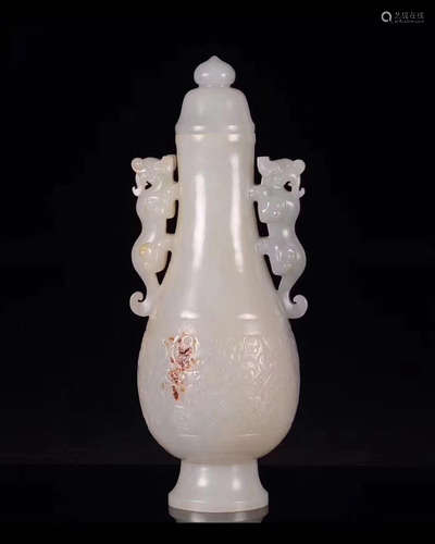 A HETIAN WHITE JADE CARVED VASE