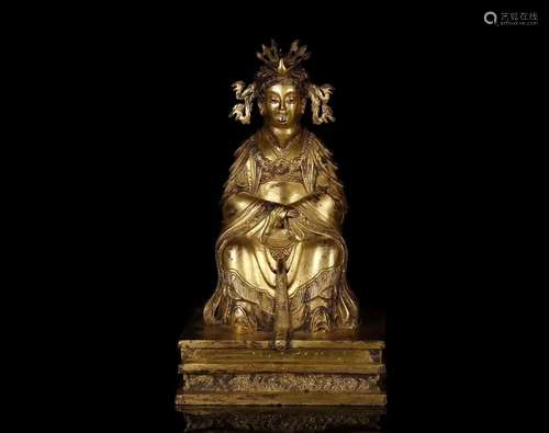 A GILT BRONZE CARVED BUDDHA STATUE