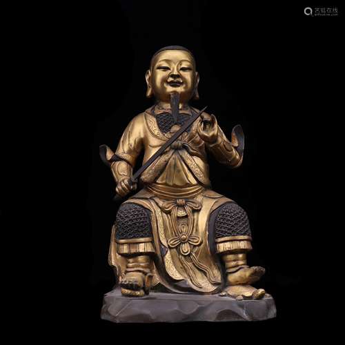 A GILT BRONZE MOLDED BUDDHA STATUE