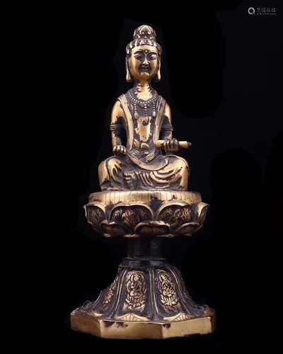 A GILT BRONZE CARVED GUANYIN STATUE