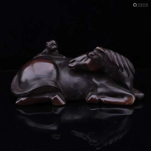 A COPPER HORSE SHAPED FIGURE