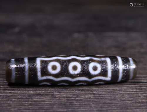 A TEN-EYE DZI BEAD