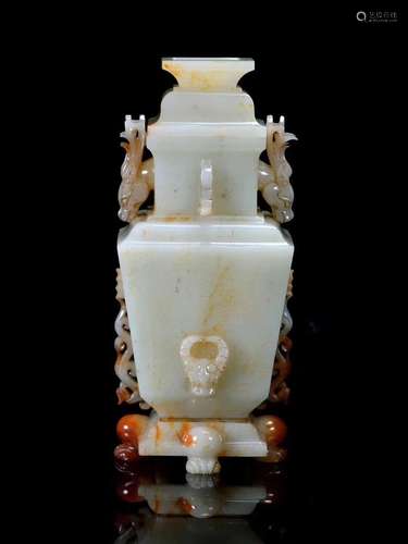 A HETIAN JADE CARVED BEAST PAW STAND VASE