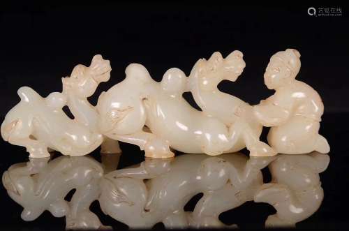 A HETIAN JADE CAMEL SHAPED BRUSH HOLDER