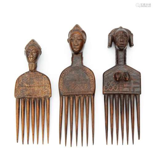 Three West African wooden hair combs