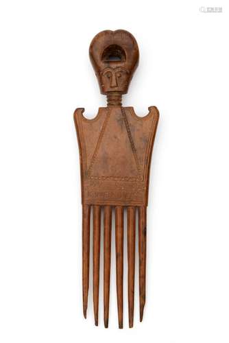 A West African wooden hair comb