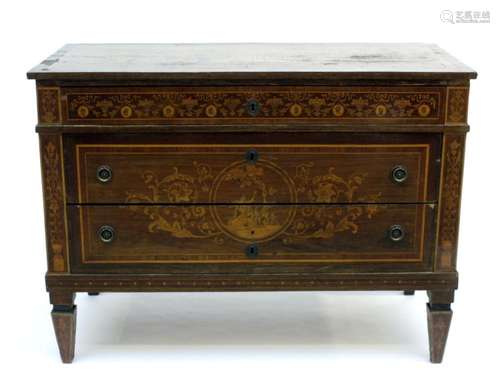 A Louis XVI style chest of drawers