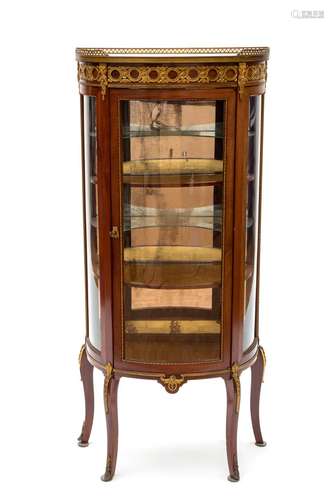 A Louis XVI style display cabinet