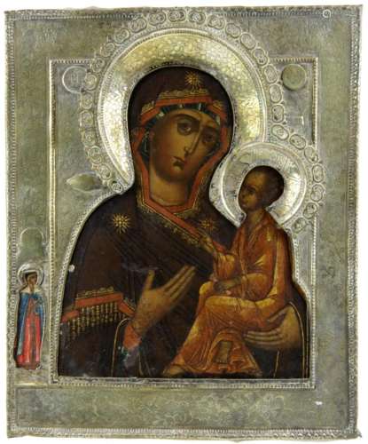 A painted Russian icon with metal riza