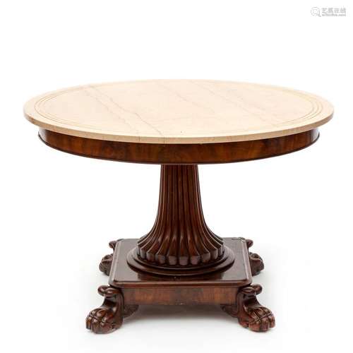 A mahogany circular table